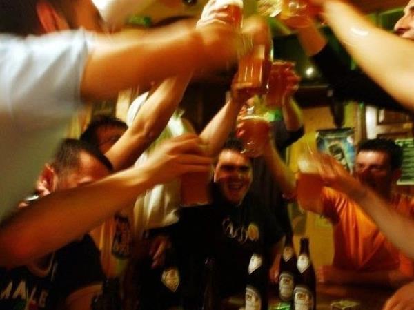 STRASBOURG, FRANCE -- Italian students from the Primo Levi Technical Institute of Vignola in the Modena Province, toast with glasses of beer in a pub during a school trip to Strasbourg, France to visit the European Parliament on May 18, 2004.